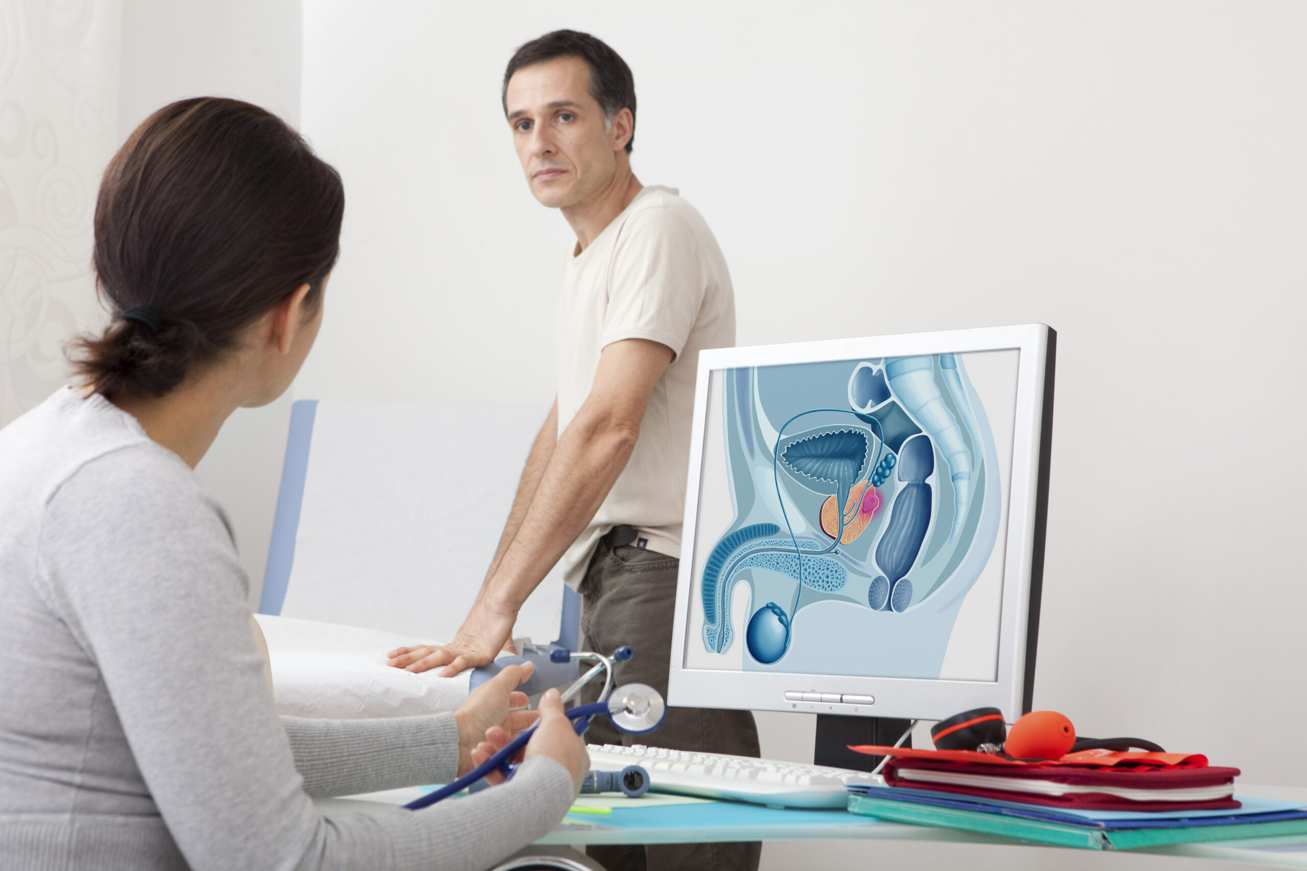 Doctor talking to patient about prostate cancer testing